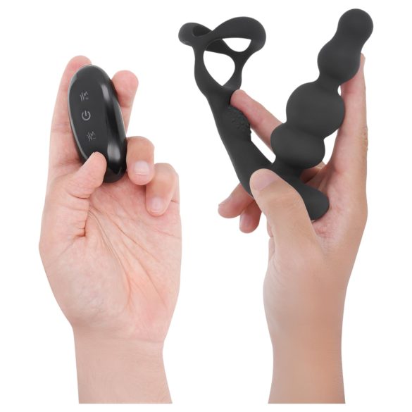 Addicted Toys - rotierender Analdildo mit Penisring (schwarz)